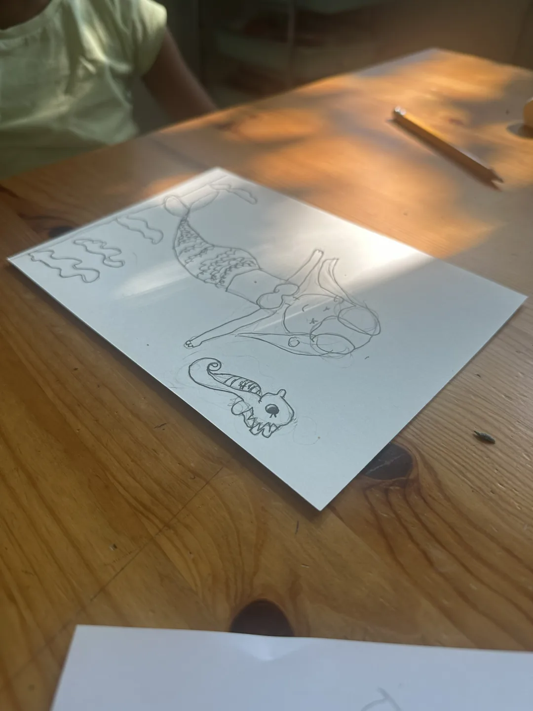 Children's drawings made from a shared creative prompt